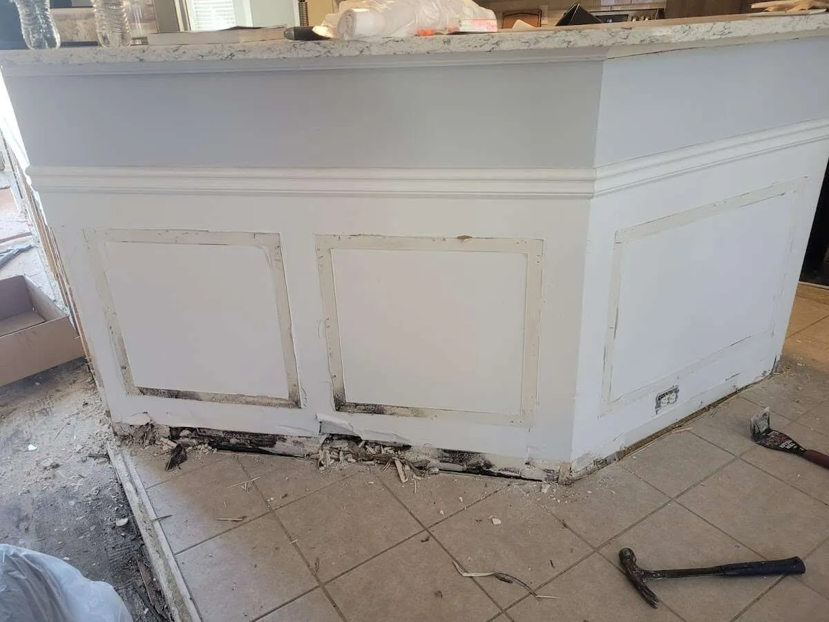 Water damage and mold on kitchen during Storm Damage Restoration in Walkertown